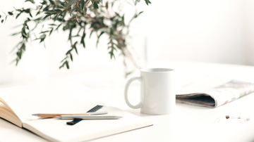 a white mug in a desk